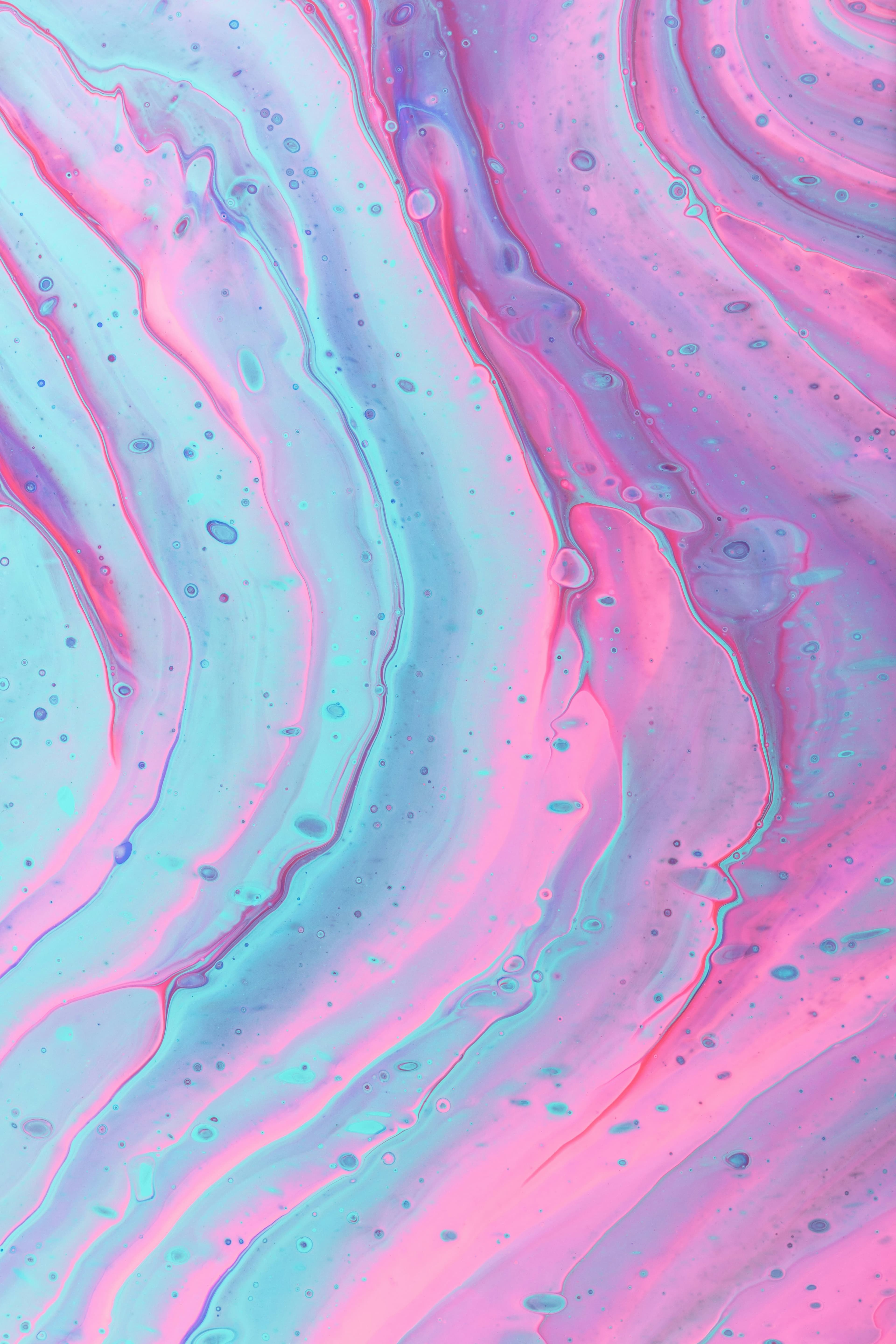 Colorful abstract liquid art with vibrant flowing paint